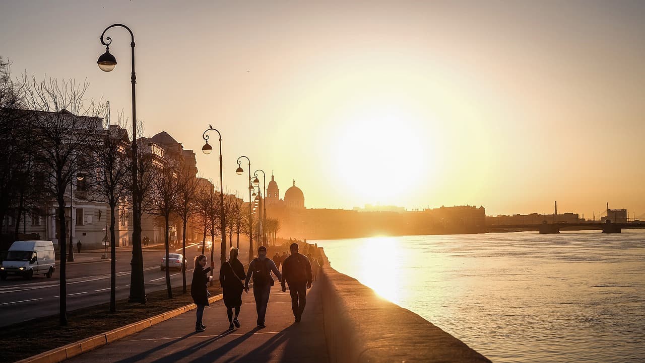 People Walking at Sunset